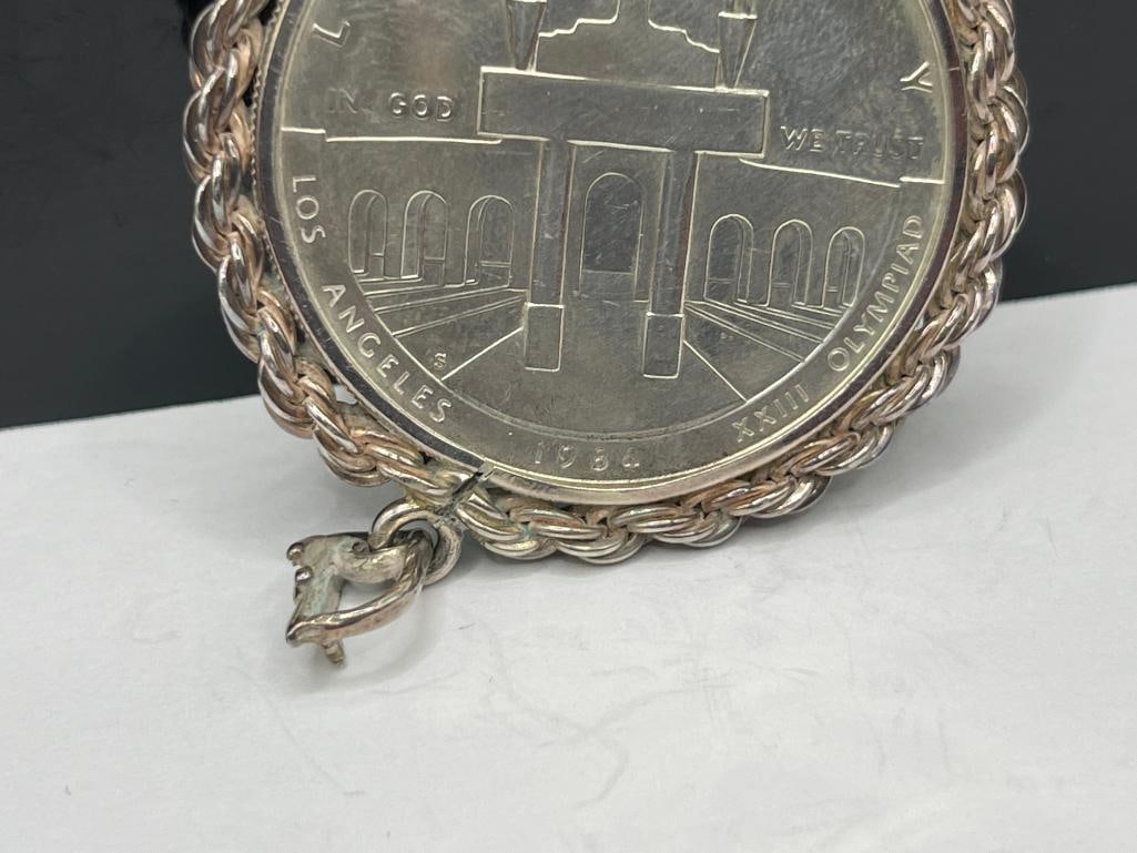 1984 U.S. OLYMPIC LIBERTY SILVER DOLLAR ENCASED IN STERLING SILVER PENDANT - 6