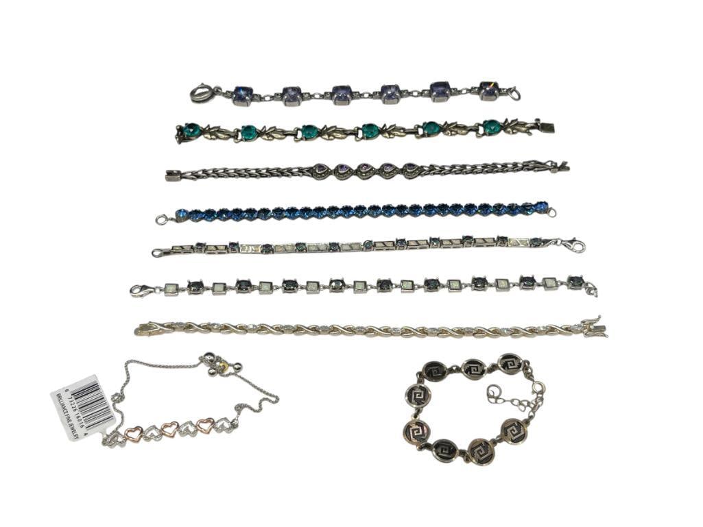 ASSORTED STERLING SILVER FASHION BRACELETS INCLUDING AMETHYST, OPALITE, SIGNED PIECES, AND MORE: GREAT ASSORTMENT WITH A VARIETY OF TONES 108.08 GRAMS 