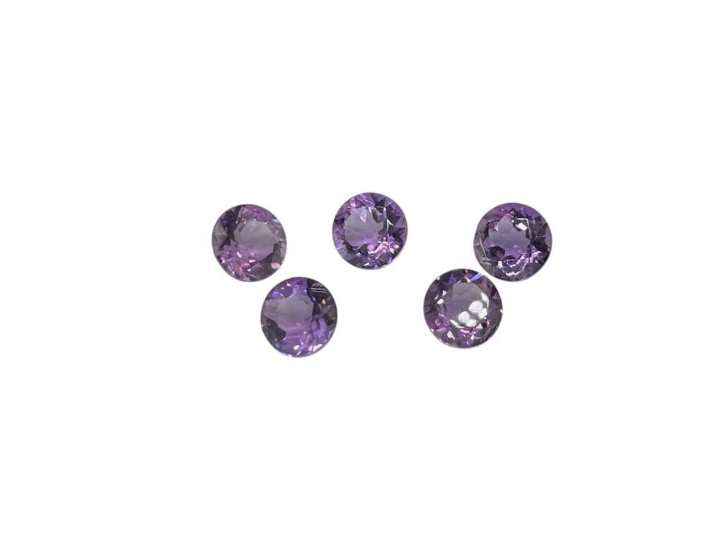 FOUR ROUND CUT AMETHYST GEMSTONES (1 of 4)