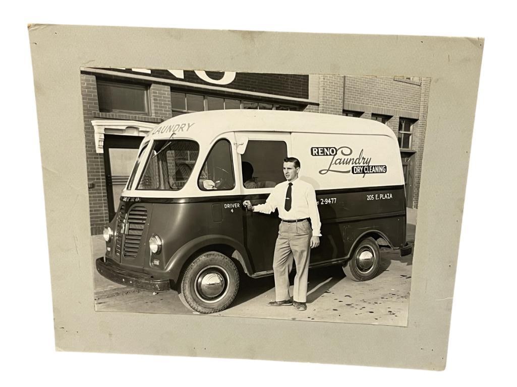 CIRCA 1950'S BLACK AND WHITE PHOTOGRAPH OF DRIVER FOR RENO LAUNDRY NEXT TO METRO VAN: PHOTO CAPTURES A HISTORIC MOMENT OF AN INTERNATIONAL METRO VAN AND DRIVER 17" X 14" OVERALL