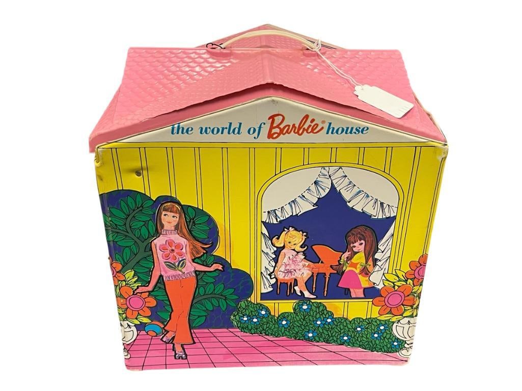 1966 THE WORLD OF BARBIE HOUSE BY MATTEL VINYL AND PLASTIC PLAYHOUSE: ILLUSTRATED EXTERIOR AND INTERIOR, CARRY HANDLE AND LOCKING STRAP INTACT, THREE OF THE FOUR ROOF CORNERS HAVE DAMAGE 12 1/2" X 9" X 13" CLOSED