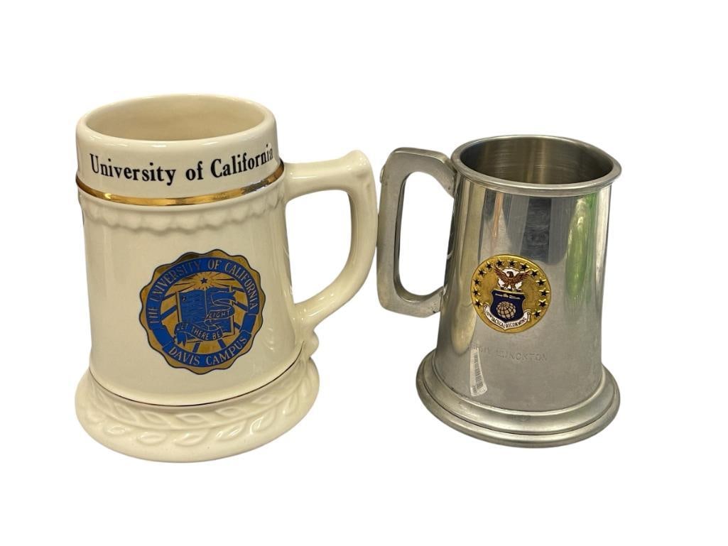 PEWTER AND CERAMIC MUGS UNIVERSITY OF CALIFORNIA DAVIS CAMPUS 10TH TACTICAL RECON WING: ENGLISH PEWTER MUG AND U.S.A. MADE CERAMIC MUG, PEWTER MUG HAS SMALL DENT ON ITS SIDE 5 1/4" AND 6 1/4" H