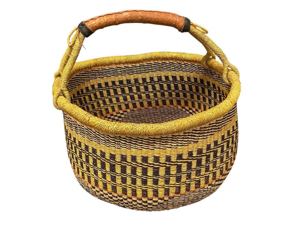 GHANA BOLGA HAND WOVEN AFRICAN BASKET WITH LEATHER WRAPPED HANDLE: YELLOW, PURPLE, AND ORANGE DYED DESIGN 16" ROUND 