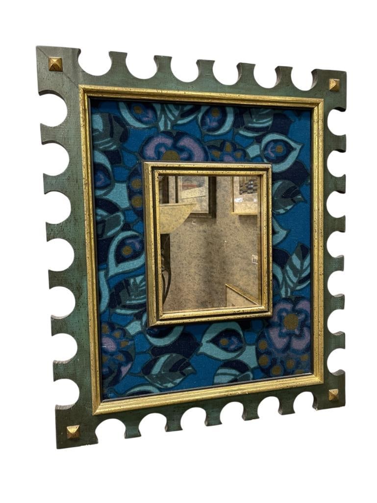 VINTAGE 1960'S - 1970'S WALLMIRROR WITH DECORATIVE CLOTH BORDER: PAINTED WOOD FRAME WITH STYLIZED LEAF CLOTH BORDER 21 1/2" X 25 1/2" FRAME 