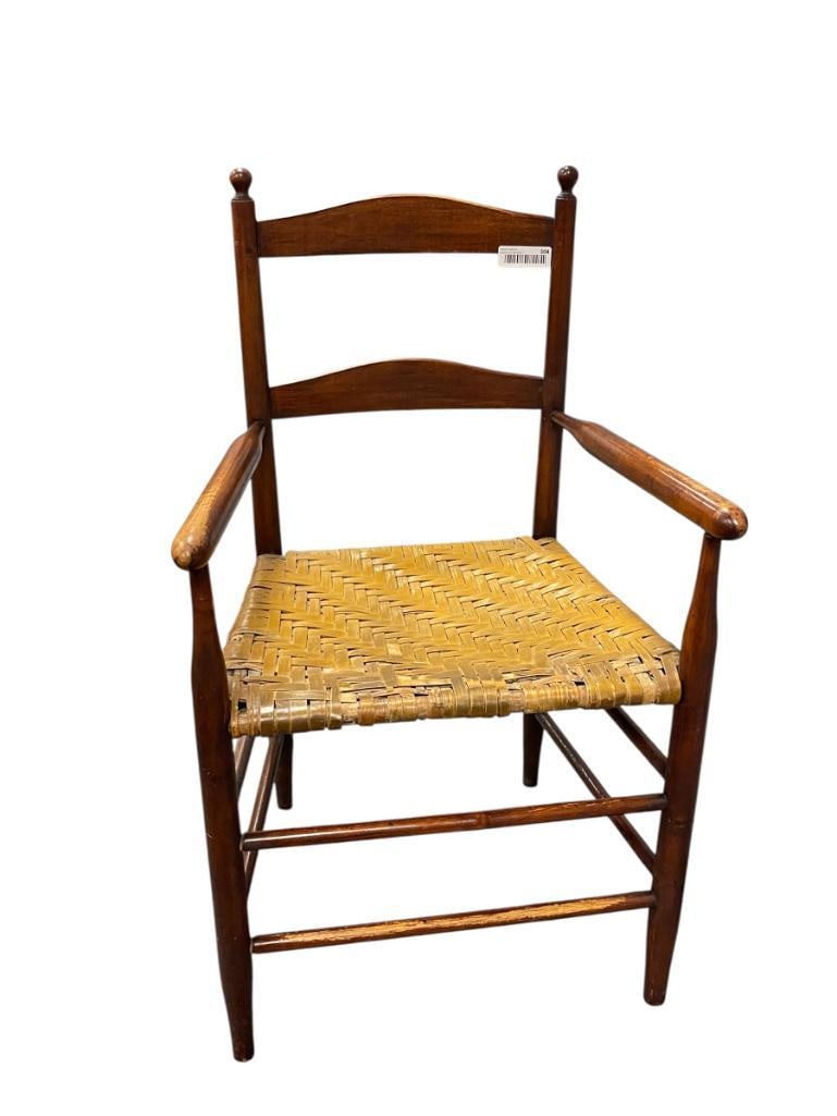 ANTIQUE WOOD ARMCHAIR WITH HAND WOVEN RUSH SEAT AND LADDER BACK (1 of 10)