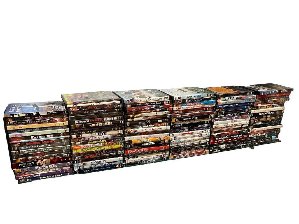 APPROX. 110 DVDS FEATURING A VARIETY OF GREAT MOVIES: SEE PHOTOS FOR TITLES, ALL WITH COVERS, SOME STILL SEALED 