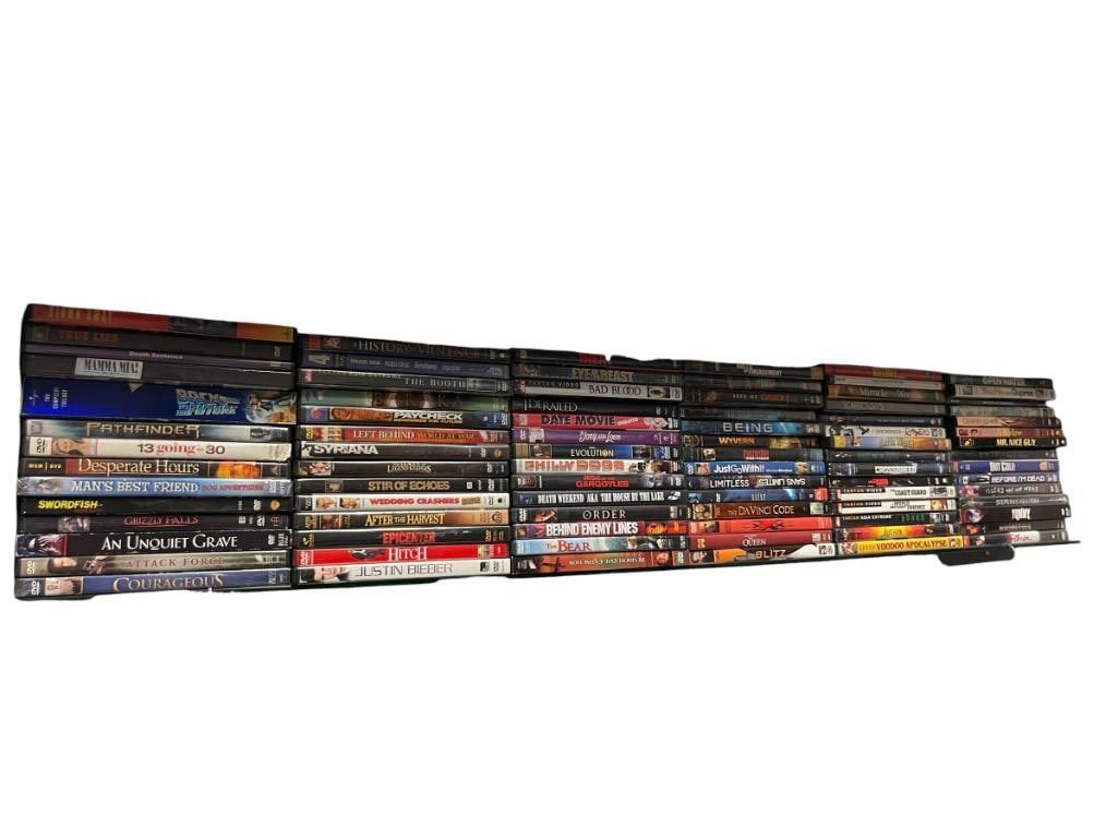 APPROX. 85 DVDS FEATURING A VARIETY OF GREAT MOVIES: SEE PHOTOS FOR TITLES, ALL WITH COVERS, SOME STILL SEALED 