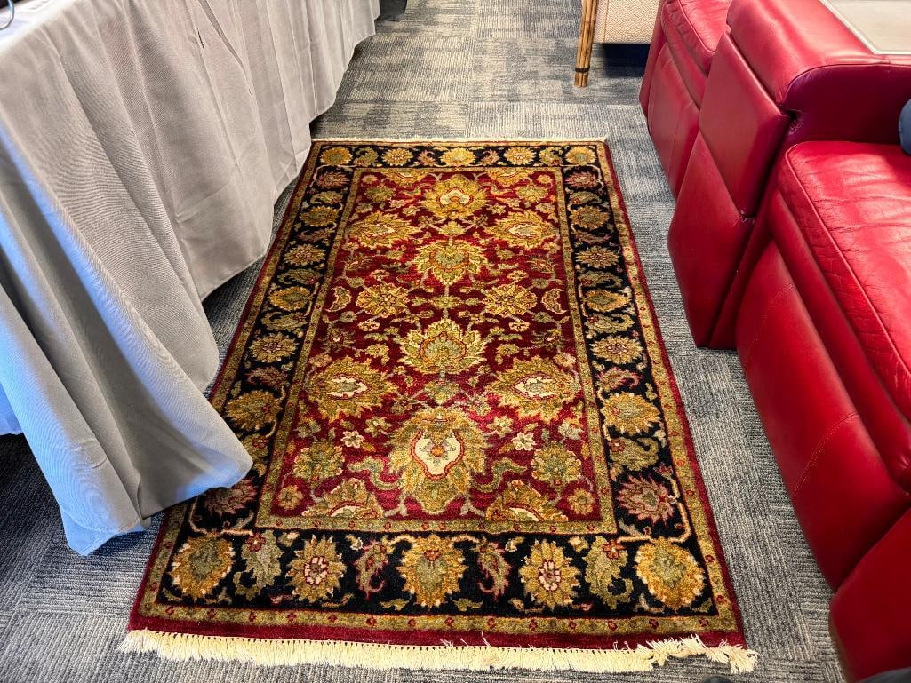 INIAN INDO-JAIPUR 100% WOOL PILE VEGETABLE DYE HAND WOVEN AREA RUG TRADITIONAL DESIGN: RED, GREEN, BROWN, BLACK TRADITIONAL DESIGN, ORIGINAL PURCHASE PRICE SAIF TO BE $791, STATED BY THE ESTATE 36" X 50" 