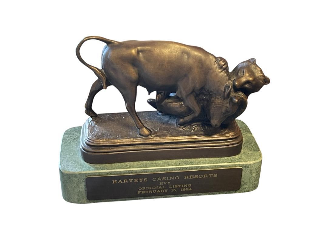 HARVEY'S CASINO RESORTS FAMOUS NEW YORK STOCK EXCHANGE BULL BRONZE AWARD / TROPHY: TROPHY / AWARD FROM THE ORIGINAL BY ISIDORE BONHEUR CREATED IN 1900, SCULPTURE DEPICTS WOLF TRYING TO TAKE DOWN A BULL, MOUNTED ON GREEN MARBLE BASE WITH ENGRAVED BRASS PLAQUE ON THE FRONT, SCULP