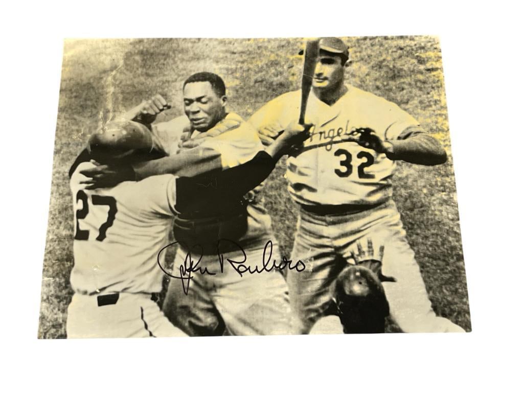 JOHN ROSEBORO AUTOGRAPHED PHOTOGRAPH OF FIGHT BETWEEN JUAN MARICHAL WITH SANDY KOUFAC: SPORTS HISTORY MOST VIOLENT BRAWL BETWEEN JUAN MARICHAL SWINGS BAT AT JOHN ROSEBORO WHILE SANDY KOUFAX STEPS IN TO INTERVENE, SIGNED BY JOHN ROSEBORO (1933-2002) FORMER AMERICAN BASEBALL CATCHER AND