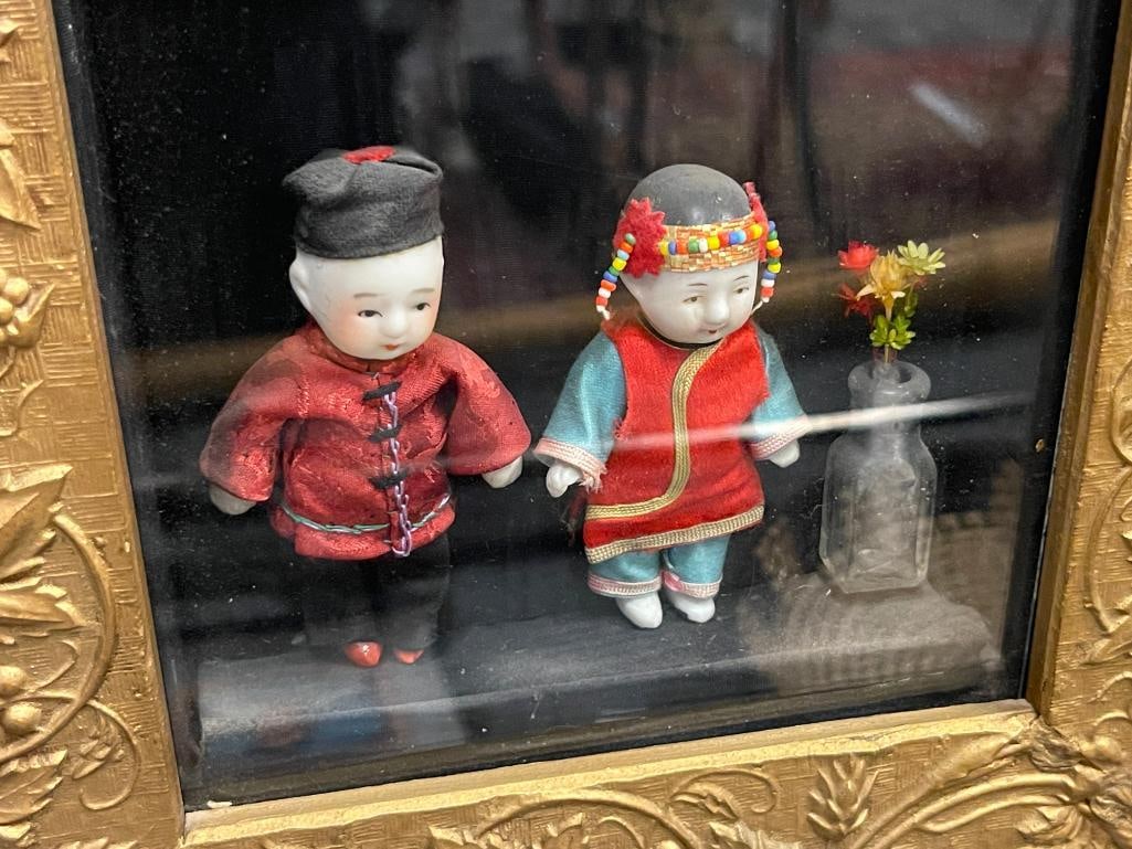 ANTIQUE GILT WOOD FRAMED FOLIATE DESIGN SHADOWBOX FRAME FEATURING ANTIQUE PORCELAIN DOLLS - 6