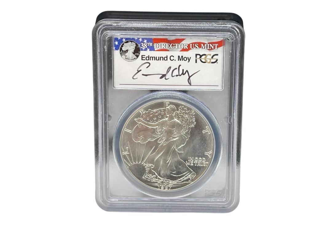 1987 U.S. AMERICAN SILVER EAGLE PCGS MS69 MOY SIGNATURE: CASE FEATURES SIGNATURE OF EDMUND C. MOY 1 TROY OUNCE 