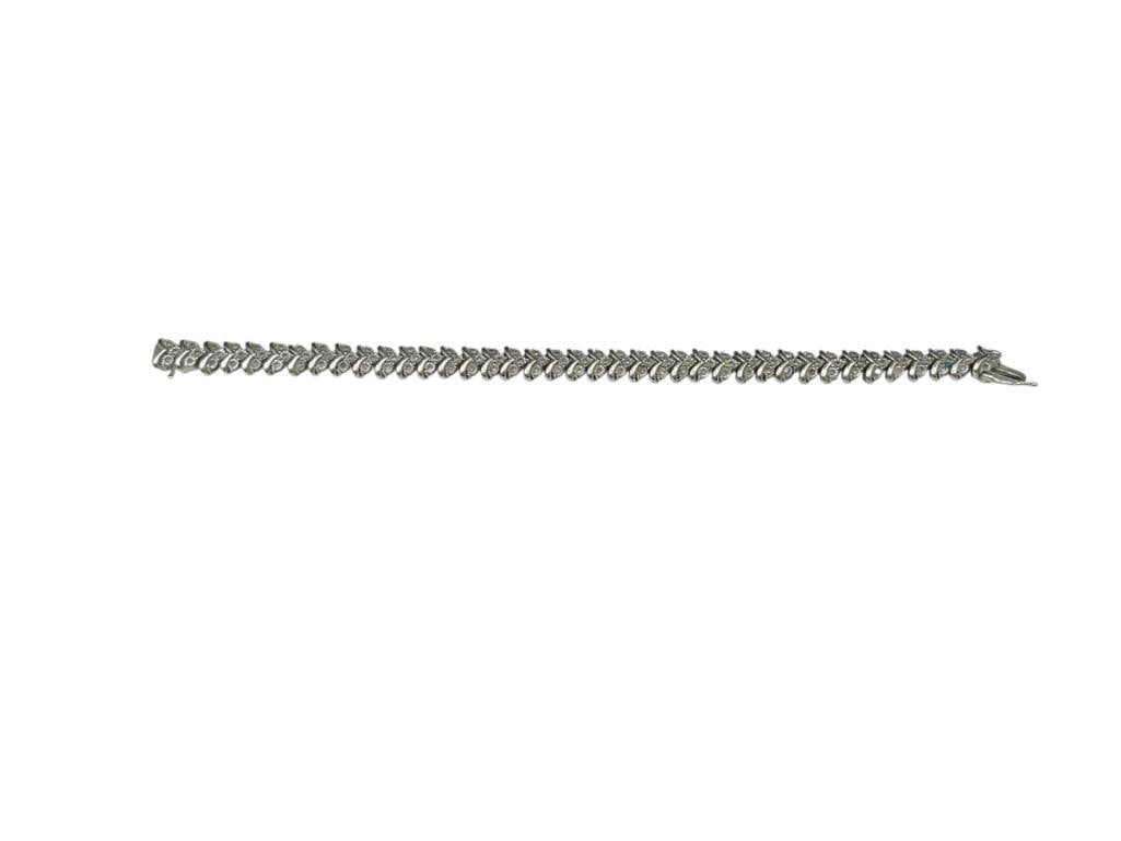 STERLING SILVER DIAMOND ACCENTED FASHION BRACELET FEATURING ROUND CUT DIAMONDS IN LINKS: FEATURING APPROX. 120 DIAMONDS .50CTTW DIAMONDS, 7" X 5/16", 14.18 GRAMS 