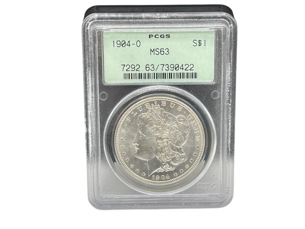 1904-O U.S. MORGAN SILVER DOLLAR PCGS MS63 "RATTLER CASE": 90% SILVER 