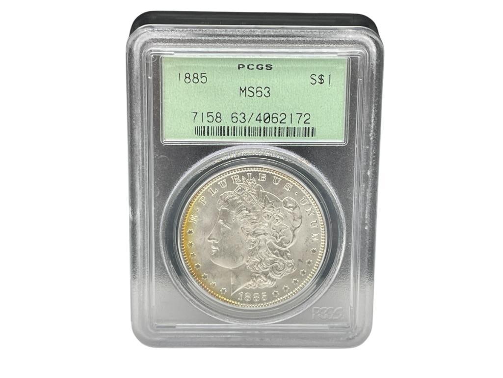1885 U.S. MORGAN SILVER DOLLAR PCGS MS63 "RATTLER CASE": 90% SILVER 