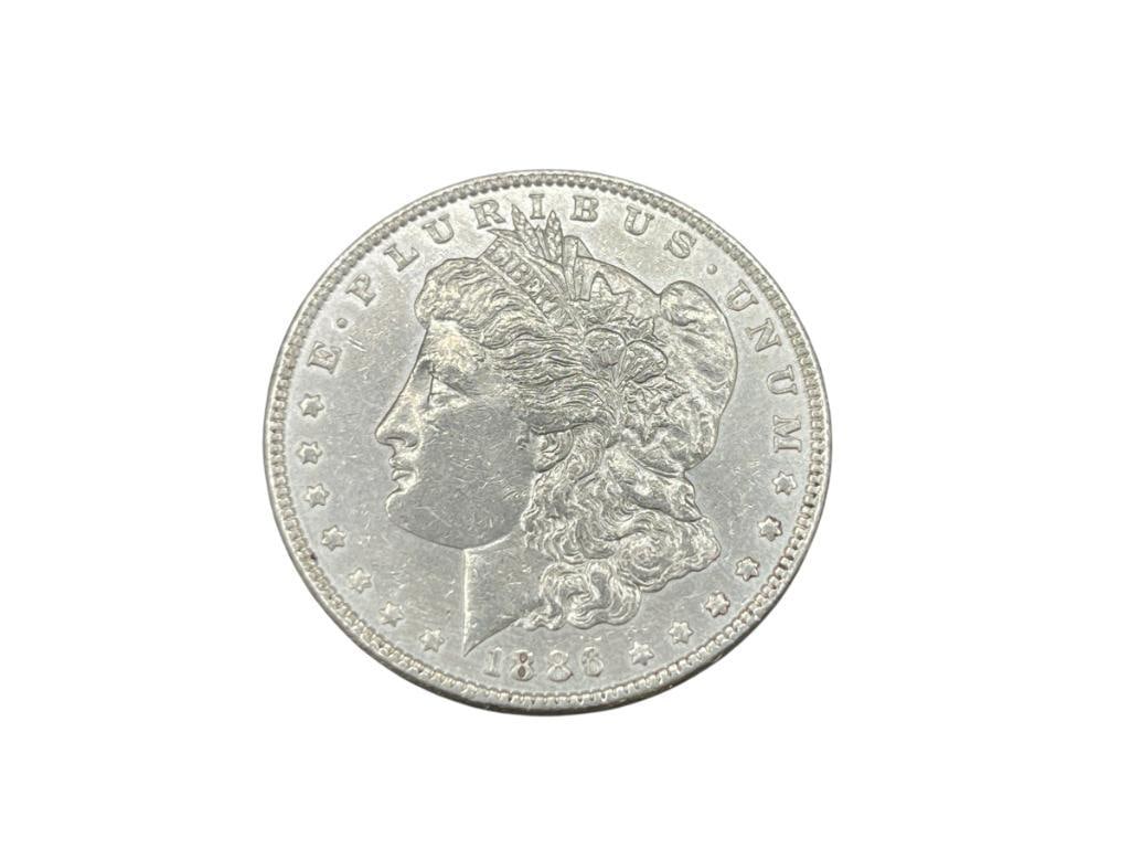 1886 U.S. MORGAN SILVER DOLLAR (1 of 6)