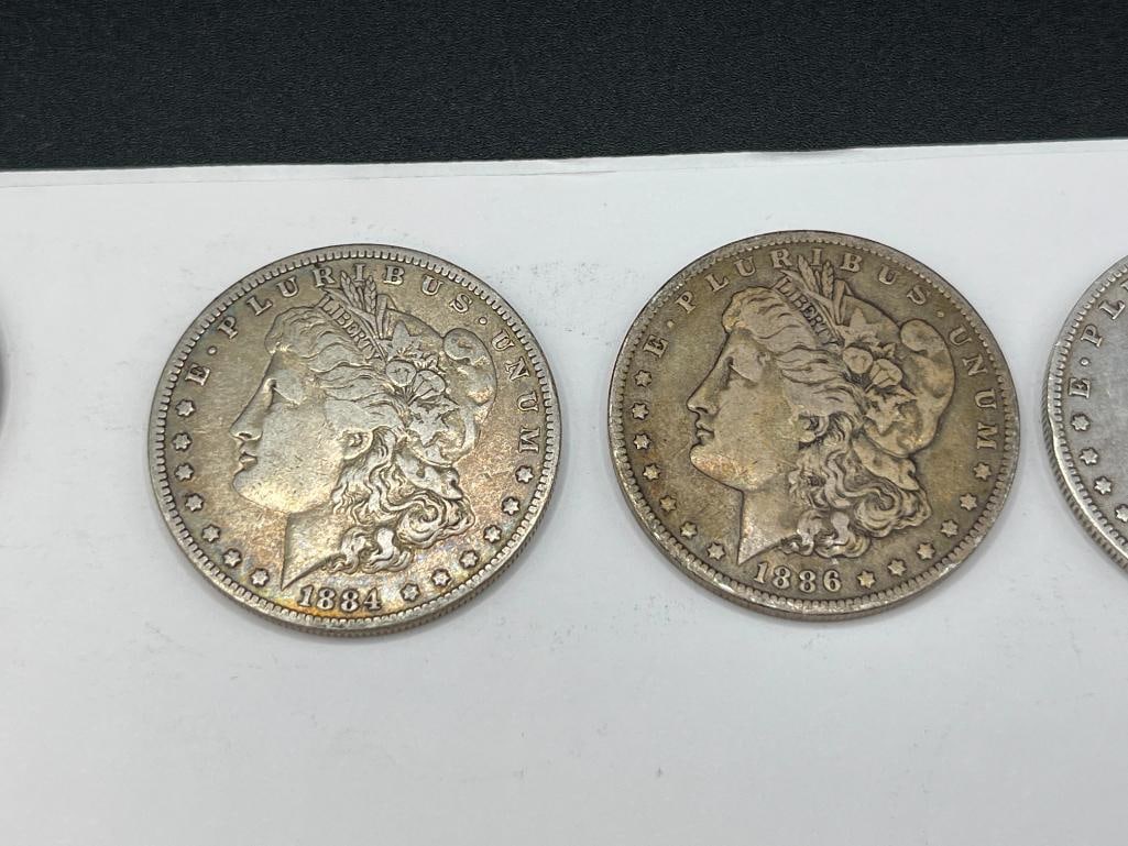 FIVE U.S. MORGAN SILVER DOLLARS FEATURING VARIOUS DATES AND MINT MARKS - 4