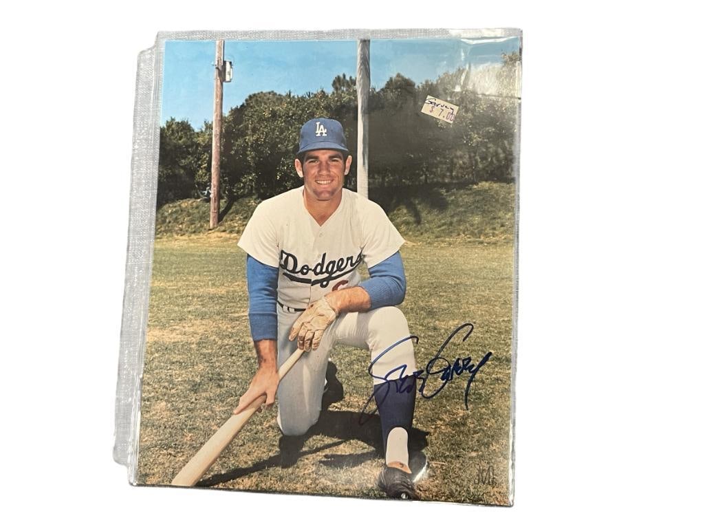 STEVE GARVEY FORMER AMERICAN BASEBALL PLAYER AUTOGRAPHED COLOR PHOTOGRAPH: GARVEY PLAYED FROM 1969-1987 FOR THE DODGERS AND PADRES, 1981 WORLD SERIES CHAMPION, 10X ALL-STAR, FROM THE ESTATE OF A LOCAL RENO, NV DOCTOR AT RENOWN WHO RAN BIG LEAGUE SPORTS MEDICINE