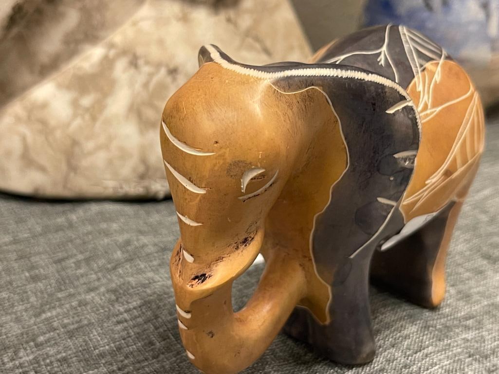 HEAY CARVED SOAPSTONE ELEPHANT FIGURINE WITH FISH CARVINGS ON ITS BACK - 3