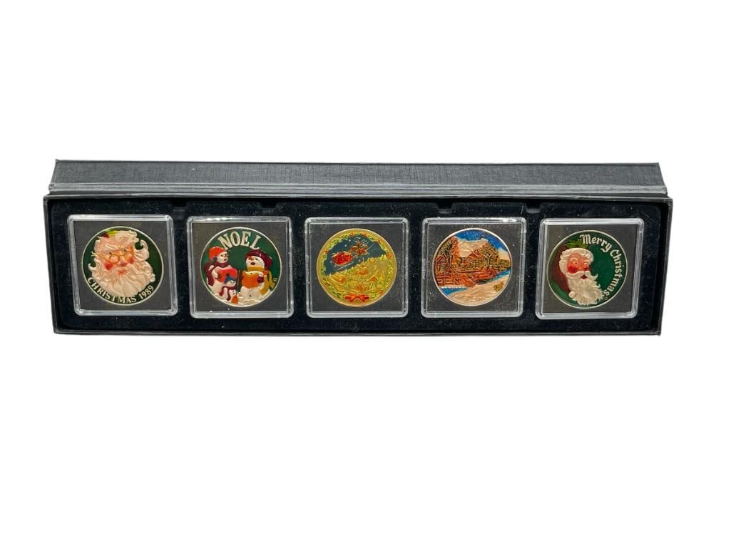 FIVE ENAMELED CHRISTMAS HOLIDAY THEMED .999 FINE SILVER ROUNDS FEATURING SANTA CLAUS AND MORE: DATES FROM 1980'S AND 1990'S 1 TROY OUNCE EACH 