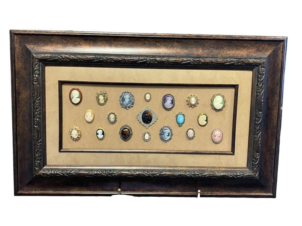 ARTISAN MADE LARGE DISPLAY OF VICTORIAN STYLE CAMEOS RHINESTONE / BEJEWELD: POSSIBLY MADE FROM OLD BROOCHES OR PENDANTS, TOTAL OF 19, FRAMED 30 1/2" X 18 1/2" FRAME 1" UP TO 2 1/2" CAMEOS 
