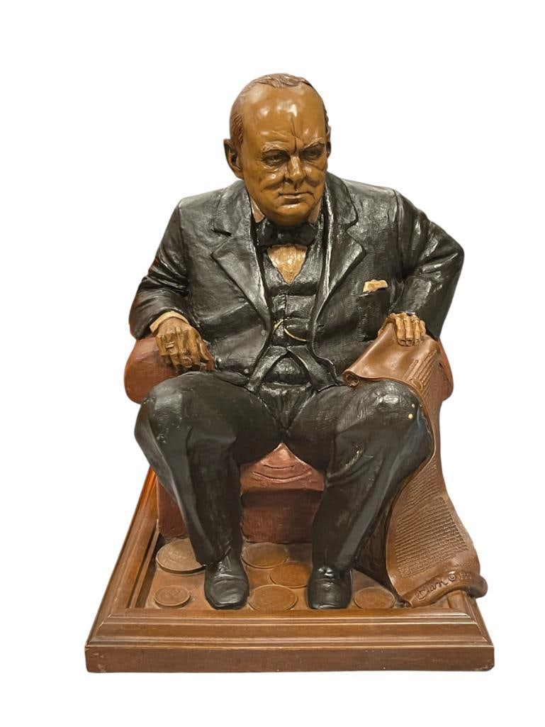1991 TOM CLARK CAIRNS STUDIO LIMITED EDITION WINSTON CHURCHILL NO. 69: STATUE DEPICTS WINSTON CHURCHILL SEATED HOLDING A SCROLL, MARKED ON THE BOTTOM RIGHT EDGE NEAR THE BASE, DOES SHOW LIGHT SCUFFS 12 3/4" H 