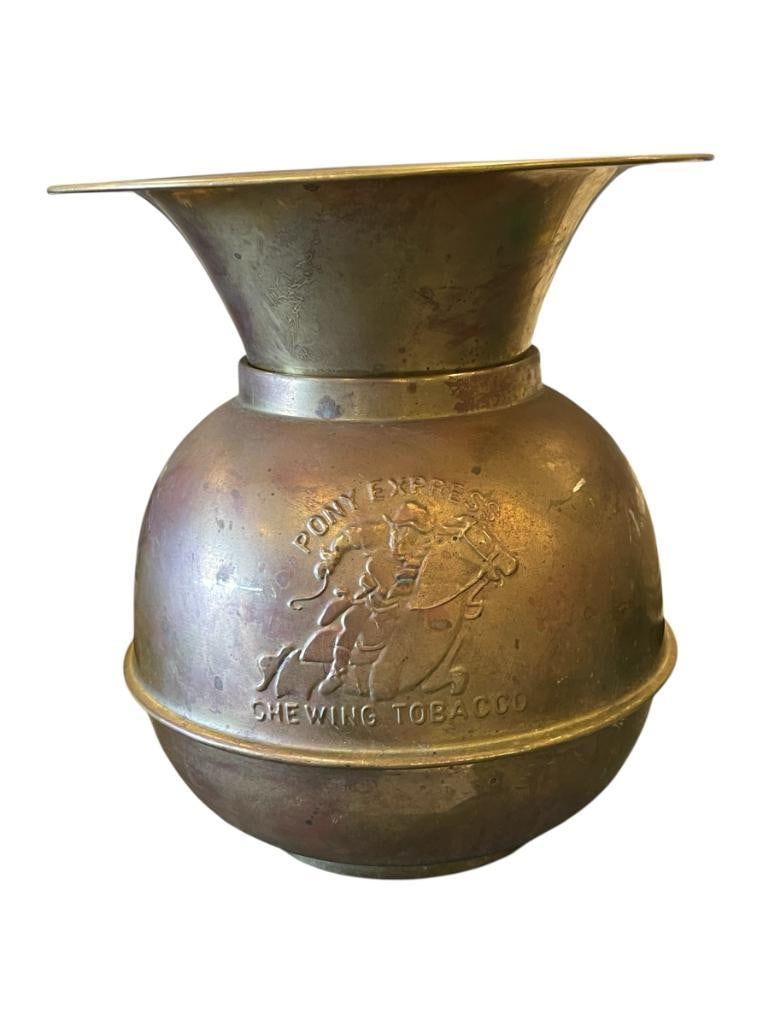 REPRODUCTION PONY EXPRESS BRASS SPITTOON: EMBOSSED LETTERING AND ILLUSTRATION, HAS DENTS AROUND THE BODY 10 1/4" H 