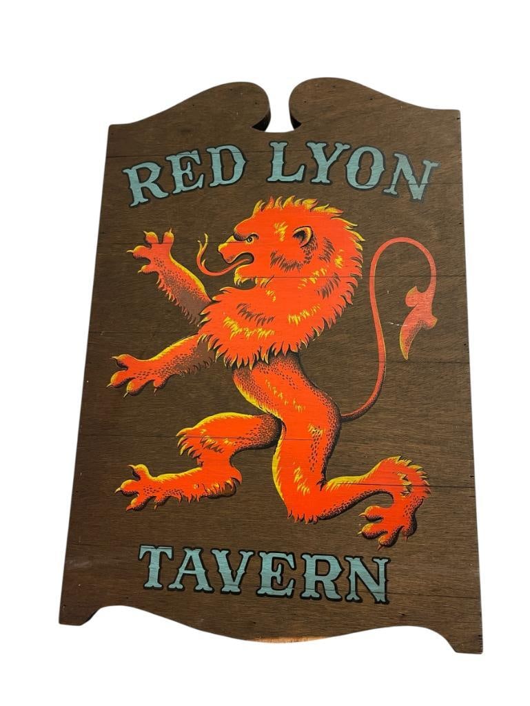 THE RED LYON TAVERN YORKCRAFT INC. 1962 WOODEN SIGNED DISPLAYED ON TAVERNS OR INNS: DARK STAINED WOODEN SIGN WITH PAINTED RED LION, INFO ON THE BACK 16" X 23 1/2" 
