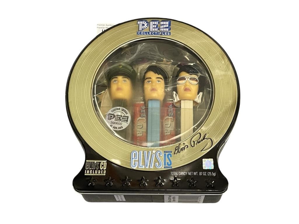 2007 LIMITED EDITION PEZ CANSY DISPENSER WITH THREE CANDY DISPENSERS IN DIFFERENT ERAS: 1958, 1968, AND 1973 STYLED CANDY DISPENSERS IN CIRCULAR TIN WITH CD, SEALED 7 1/2" H 