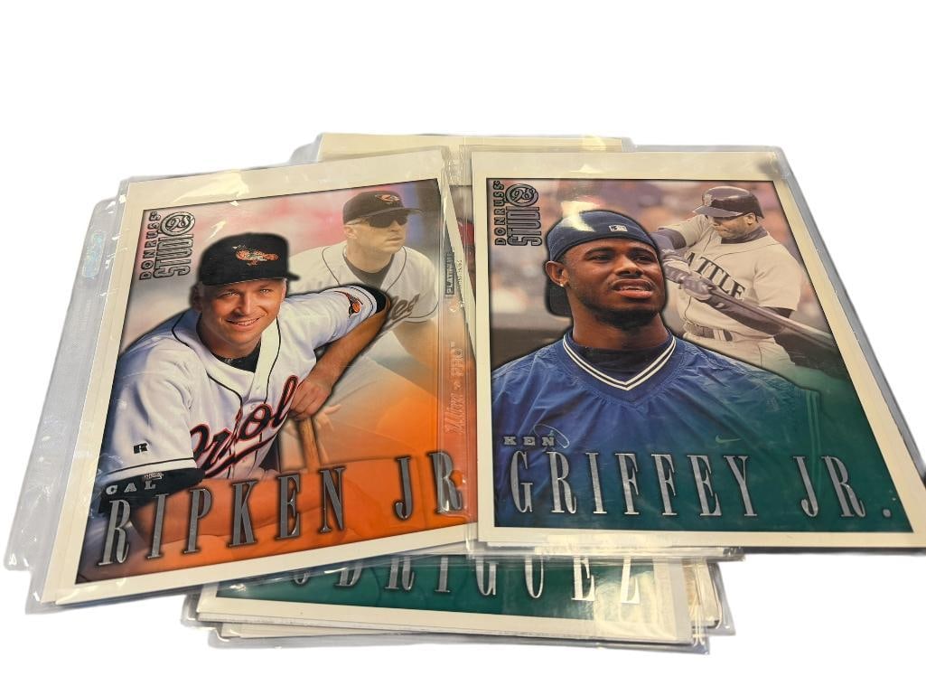 SIX DONRUSS 98 STUDIO PHOTOGRAPH BASEBALL CARDS INCLUDING KEN GRIFFEY JR., CAL RIPKIN JR., AND MORE: ALSO INCLUDES MARK MCGWIRE, ALEX RODRIGUEZ, JUAN GONZALEZ, AND JEFF BAGWELL, EACH IN PROTECTIVE SLEEVE, GREAT CONDITION 8" X 10" CARDS 