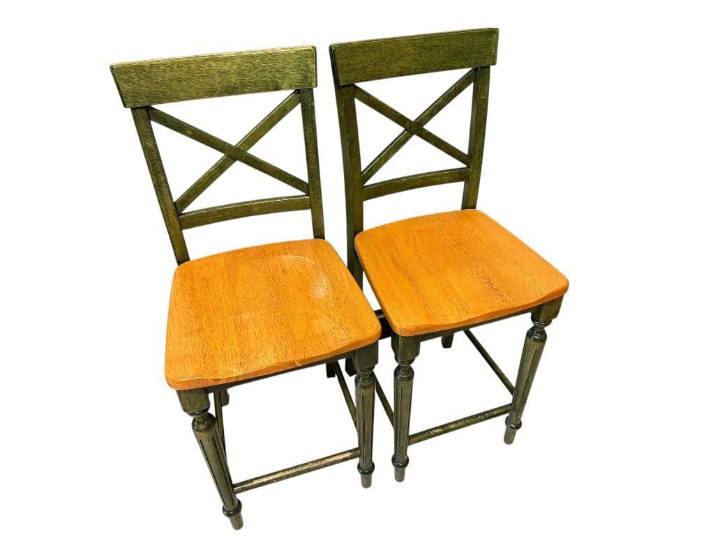 PEIR 1 IMPORTS ELEGANT TWO-TONED WOOD BARSTOOLS FEATURING DEEP GREEN PAINTED FRAME AND WOOD SEATS: SOME WEAR TO BAR WHERE FEET REST BUT OVERALL GOOD CONDITION 16" X 16" X 24" SEAT HEIGHT, 40" SEAT BACK HEIGHT