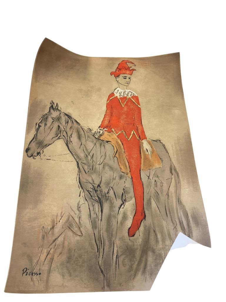 PABLO PICASSO RENOWN ARTIST PRINT TITLED HARLEQUIN ON HORSEBACK: ART DEPICTS CLOWN IN RED COSTUME ON A HORSE, PLATE SIGNED, UNFRAMED 21" X 31" 