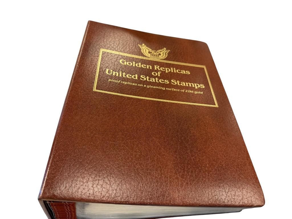 UNITED STATES POSTAL SERVICE GOLDEN REPLICAS OF UNITED STATES STAMPS IN 22KT GOLD: 33 STAMPS AND COVERS TOTAL IN BROWN LEATHERETTE BINDER WITH GOLD LETTERING 
