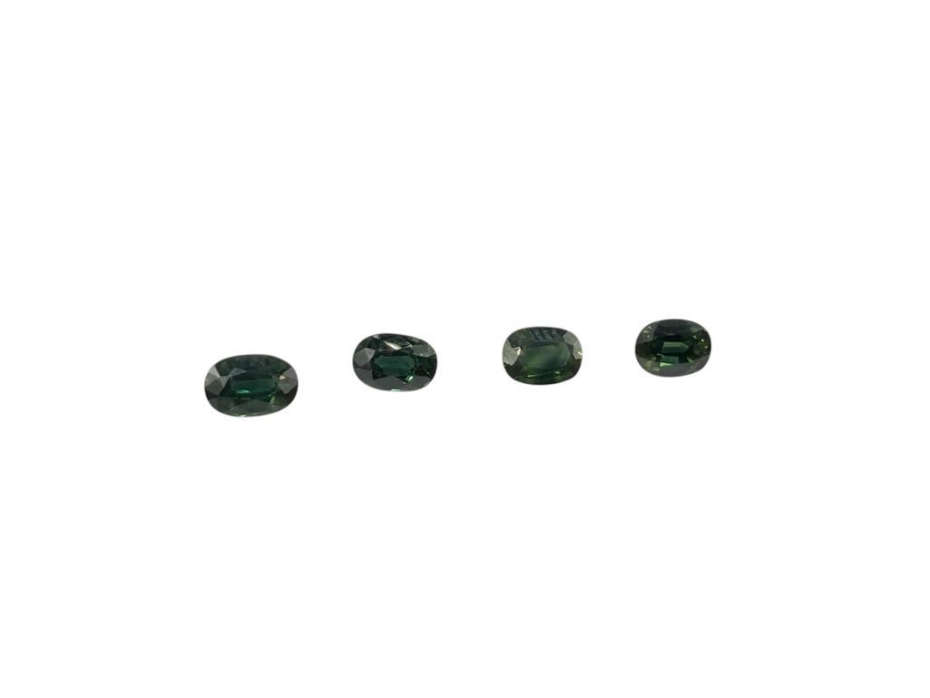 3.4CTTW OF BLUE GREEN SAPPHIRES: FOUR OVAL CUT BLUE GREEN SAPPHIRES 3.4CTTW 
