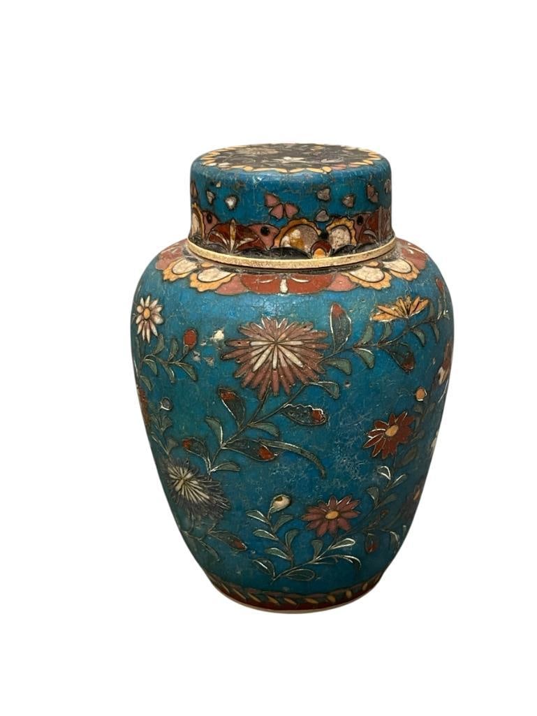19TH CENTURY JAPANESE MEIJI-ERA CLOISONNE ENAMELED POTTERY TEA JAR / CADDY WITH WIRE WORK: BEAUTIFUL JAPANESE TEA CADDY WITH INTRICATE ENAMELING WITH COLORFUL FLORAL AND BUTTERFLY MOTIF AROUND THE BODY AND ON THE LID, MARKED ON THE BOTTOM WITH CHARACTERS, ONE "TINY" CHIP ON THE RIM OF THE