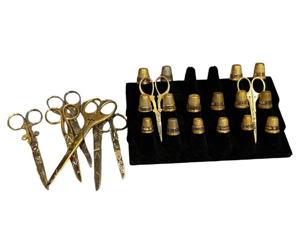 VINTAGE TOLEDO SPANISH DAMASCENE METALWORK THIMBLES AND SCISSORS SEWING TOOLS: INTRICATE BLACK AND GOLD TONE METALWORK, TOTAL OF 16 THIMBLES AND EIGHT SCISSORS IN VARIOUS SIZES, ALL WITH INTRICATE DESIGN, MADE IN TOLEDO, SPAIN 3 1/2" UP TO 6" SCISSORS 