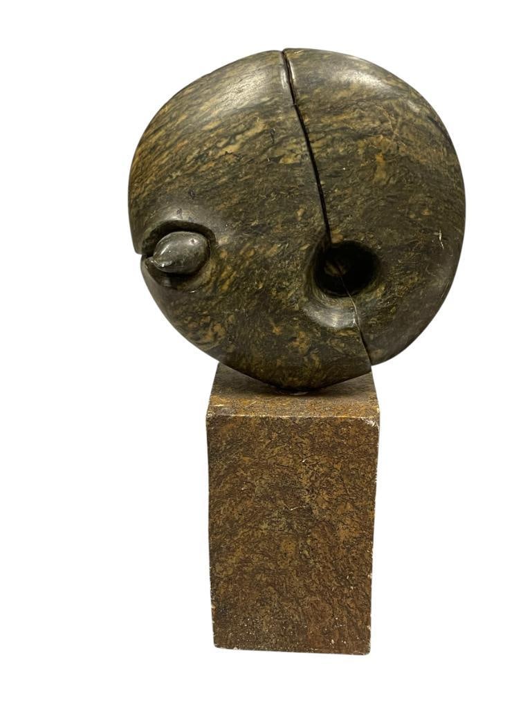 ABSTRACT GRANITE AND BASALT STONE SCULPTURE SIGNED BY ARTIST BRUCE RICHARDSON AND DATED 1986: GRANITE AND BASALT SEMI-POLISHED ROUND STONE SCULPTURE ON RECTANGULAR BROWN STONE BASE, SIGNED BY ARTIST ON TOP STONE, STONE FROM LOPEZ ISLAND 16" H 