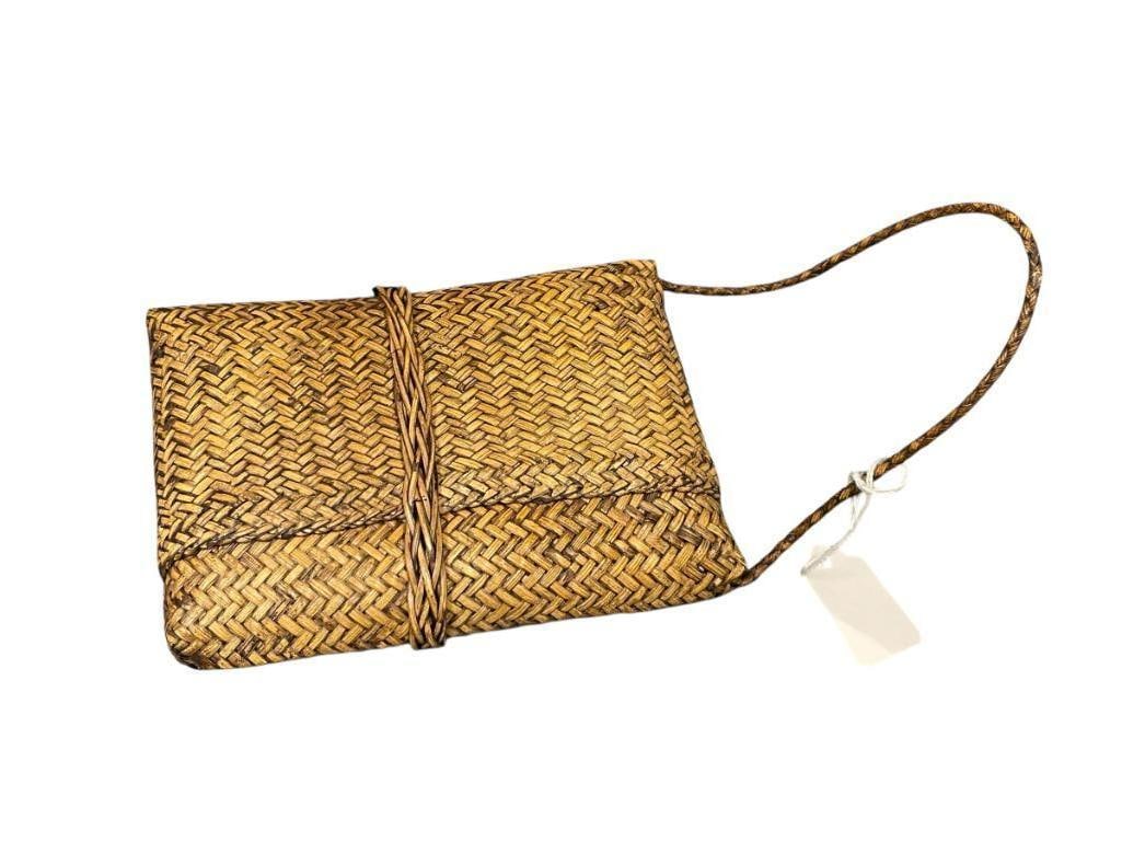 20TH CENTURY PHILIPPINES PASIKING INDIGENOUS LUZON WOVEN SATCHEL MADE FROM RATTAN: RECTANGULAR SHAPE, FEATURES LOOP STRAP WITH SLIP ON / OFF STRAP TO HOLD TOGETHER, IN GOOD CONDITION NO HEAVY WEAR 7" X 5"