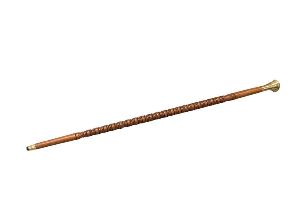 HAND TURNED WOODEN CANE WITH POLISHED BRASS HANDLE AND STONE INLAY TOP: RUBBER CAPPED END 36" L 