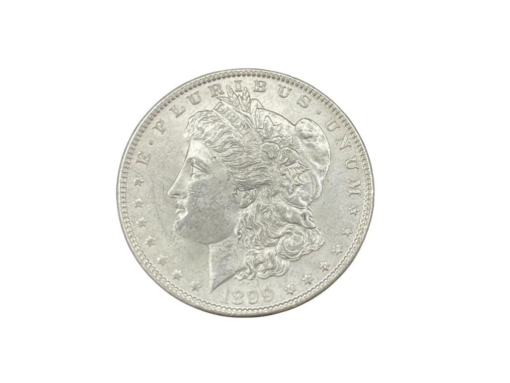 1899 U.S. MORGAN SILVER DOLLAR BU: IN VINTAGE PACKAGING, 90% SILVER 