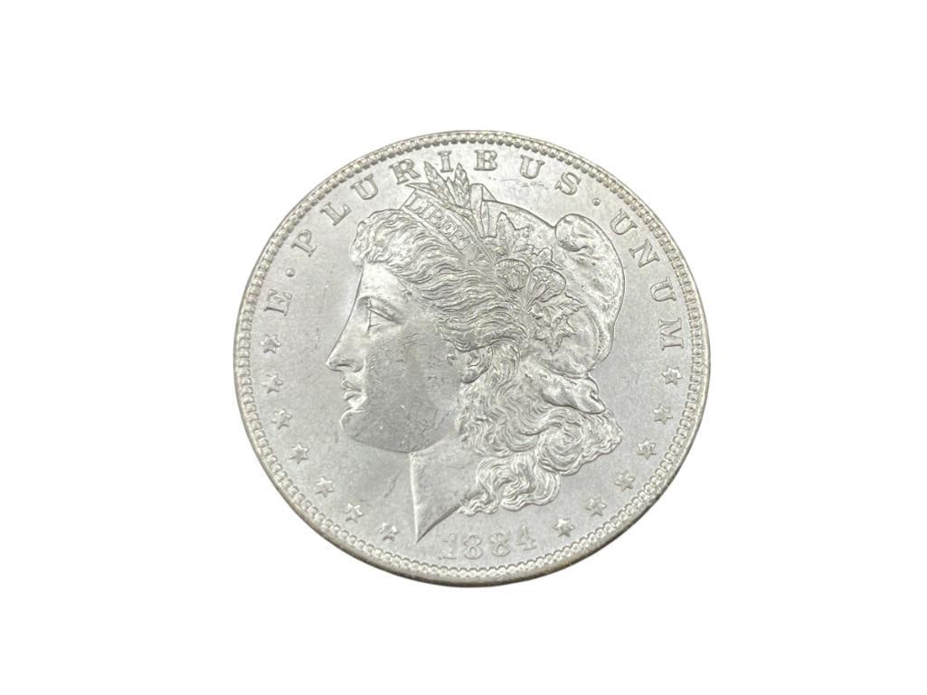1884 U.S. MORGAN SILVER DOLLAR BU: IN VINTAGE PACKAGING, 90% SILVER 