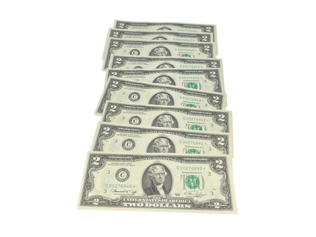 NINE 1976 U.S. $2 CURRENCY NOTES IN CONSECUTIVE ORDER: EACH BILL HAS FIRST DAY STAMPS ON BACK, IN UNCIRCULATED CONDITION 