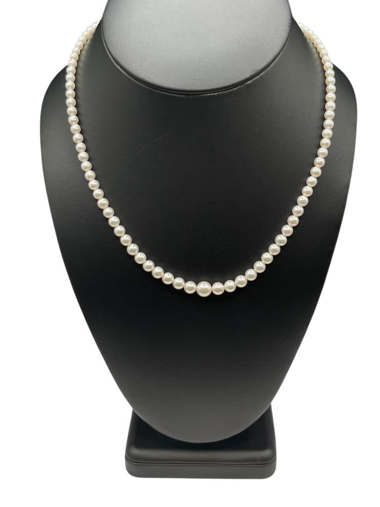 VINTAGE MIKIMOTO GRADUATED PEARL NECKLACE FEATURING A 10K WHITE GOLD CLASP: MARKED "M" ON CLASP FOR SIGNATURE MIKIMOTO HALLMARK 17", UP TO 7MM PEARLS 