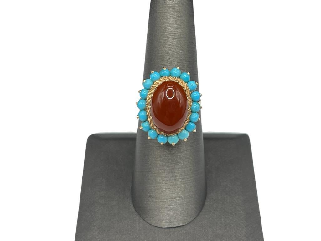 14K YELLOW GOLD CARNELIAN AND PERSIAN TURQUOISE RING: FEATURING UNIQUE MULTI-PRONG DESIGN ON SHANK, UNMARKED BUT TESTED FOR GOLD CONTENT SIZE 7,7/8" FRONT, 15MM X 10MM CARNELIAN, 2.5MM TURQUOISE, 5.13 GRAMS 