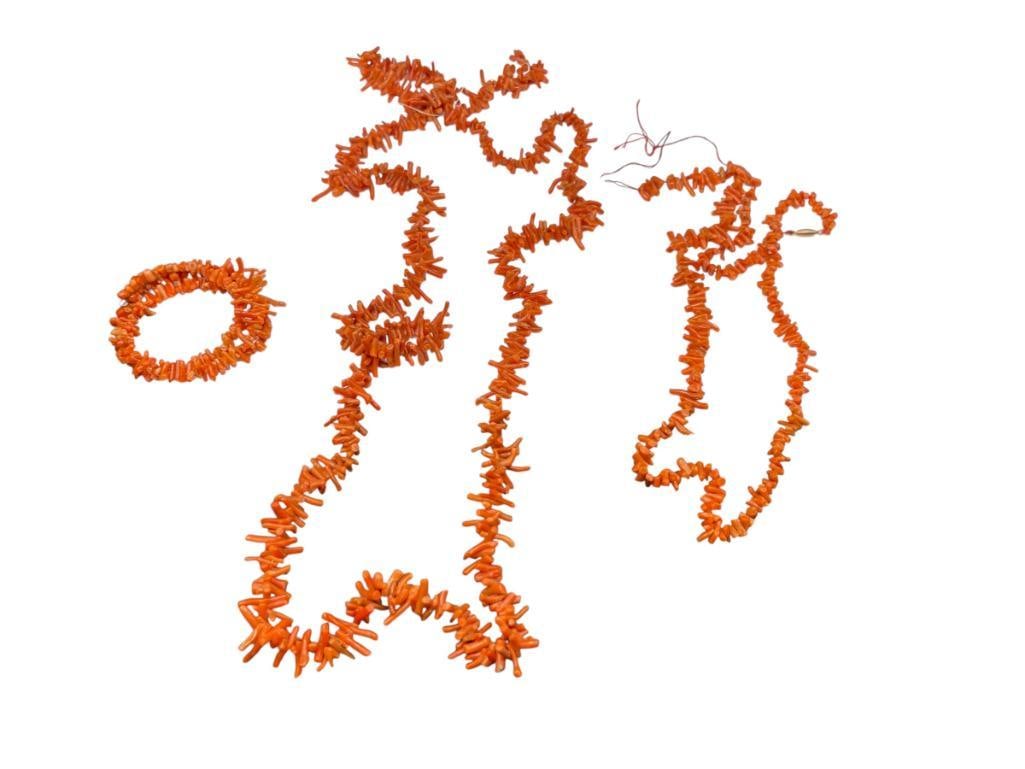 ASSORTED RED BRANCH CORAL BEADS INCLUDING SOME STRUNG ON NECKLACES AND BRACELET: STRANDS ARE DAMAGED BUT CORAL IS INTACT LONGEST STRAND IS 44", UP TO 1/2" BEADS 