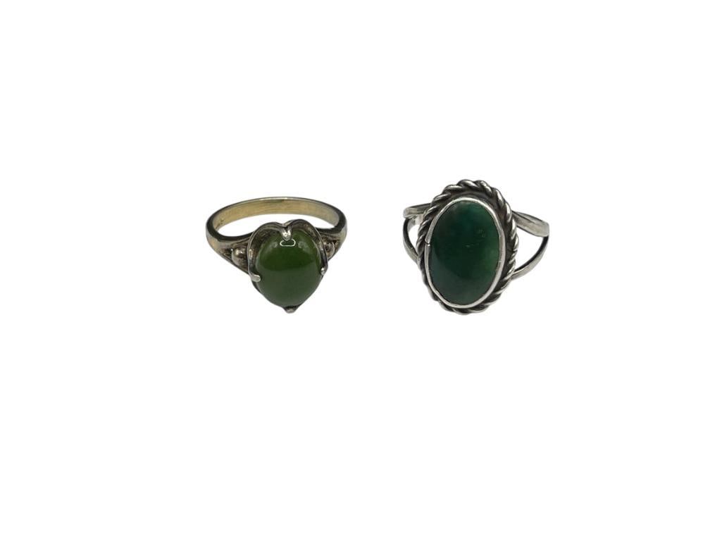 TWO VINTAGE STERLING SILVER INCLUDING A CABOCHON GREEN JADE AND OTHER FEATURES GREEN GLASS: SIZE 6, 6.79 GRAMS 