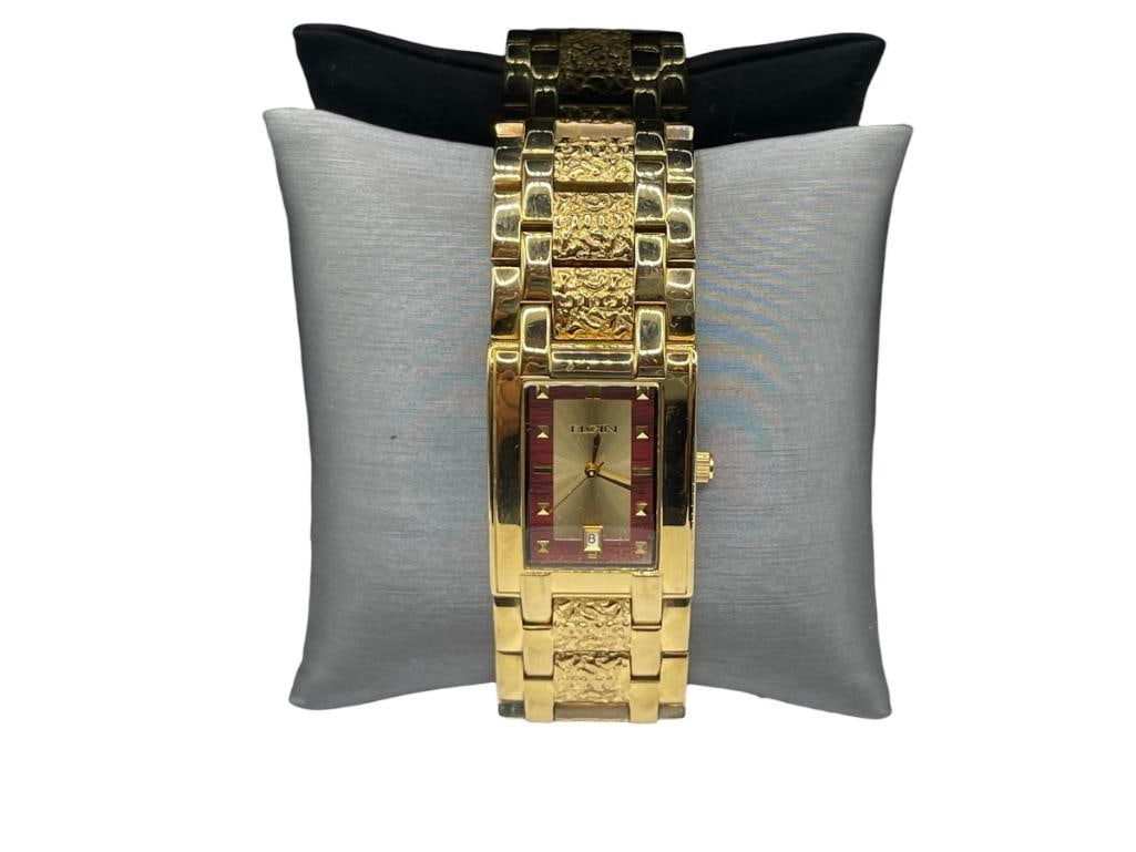 ELGIN GOLD TONE RECTANGULAR WRISTWATCH: IN RUNNING CONDITION, SERIAL # FG9038, GOLD TONE STAINLESS STEEL BAND AND CASE 26MM CASE 