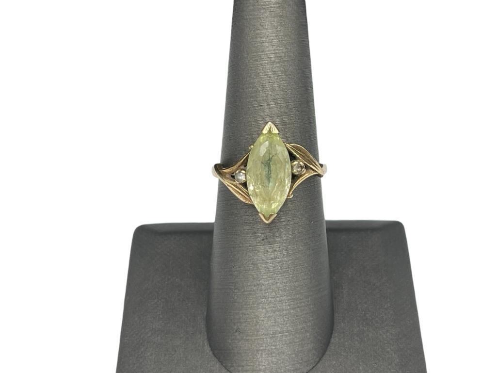 10K YELLOW GOLD MARQUISE CUT YELLOW TOPAZ AND TWO ROUND CUT DIAMONDS: DESIGNER HALLMARKED SIZE 7, 16MM X 7MM CITRINE, 1MM DIAMONDS, 3.03 GRAMS 