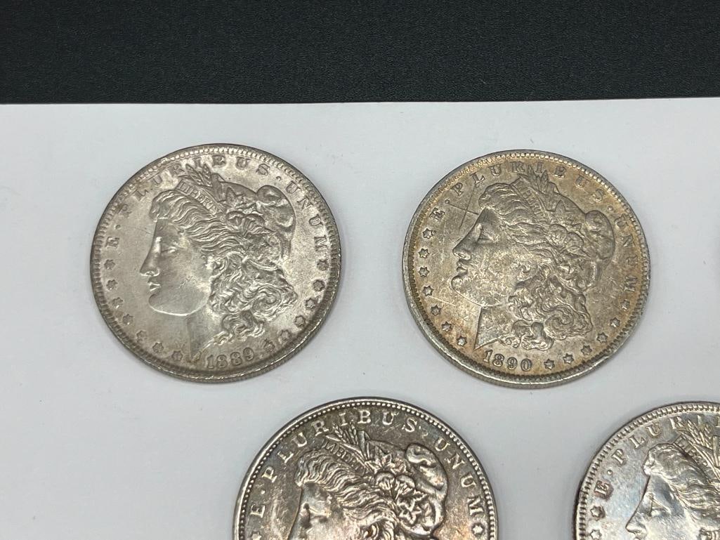 FIVE U.S. MORGAN SILVER DOLLARS FEATURING VARIOUS DATES AND MINT MARKS - 2