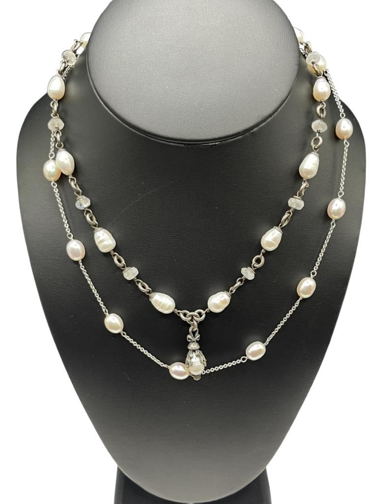 TWO STERLING SILVER PEARL ACCENTED NECKLACES INCLUDING ONE BY ALANA LOVE: INCLUDING BUTTON PEARLS WITH CLASP MARKED ALANA LOVE 16", UP TO 9MM PEARLS, 32.43 GRAMS 